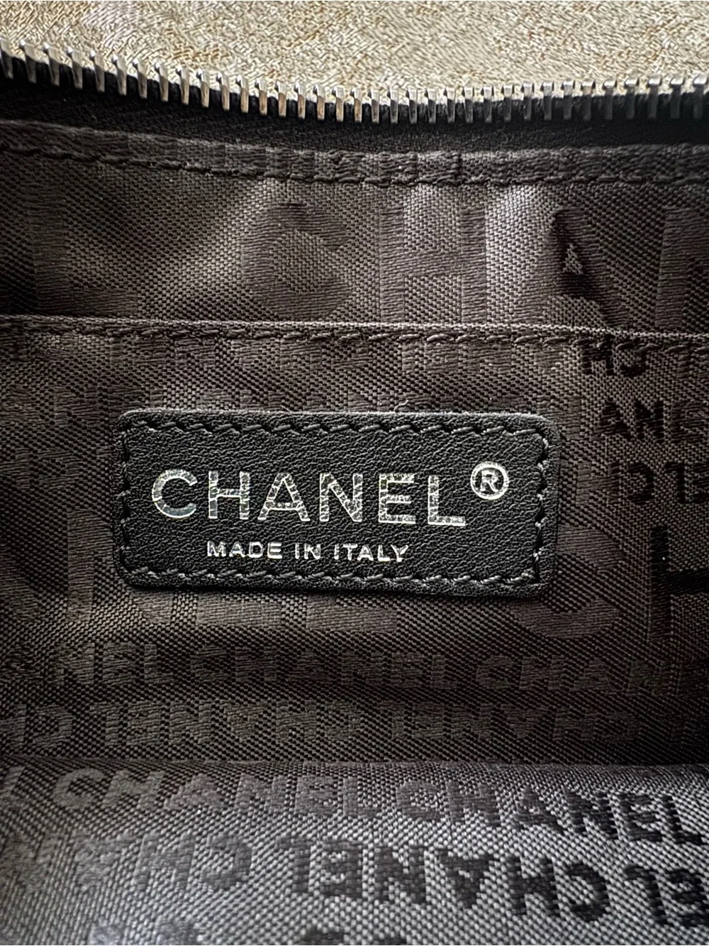 CHANEL Black Leather Wristlet Clutch with Quilted Flap and Silver Turn Locks